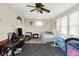 Bedroom with a ceiling fan, and many items in the room at 2150 S Emerson Ave, Indianapolis, IN 46203