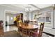 Charming dining room featuring a beautiful chandelier and views into other rooms at 2150 S Emerson Ave, Indianapolis, IN 46203