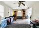Open living space with lots of clutter and a ceiling fan at 2150 S Emerson Ave, Indianapolis, IN 46203
