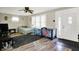 Living room with wood-look flooring and a ceiling fan at 2150 S Emerson Ave, Indianapolis, IN 46203