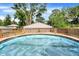 Wooden deck surrounds a pool, creating a perfect space for outdoor enjoyment and entertaining guests at 2150 S Emerson Ave, Indianapolis, IN 46203
