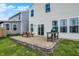 This home features a backyard patio and grill at 2473 Shadow Bend Dr, Columbus, IN 47201