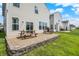 This home features a backyard patio and green space views at 2473 Shadow Bend Dr, Columbus, IN 47201