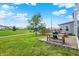 Enjoy outdoor living with a patio and grill with community green space views at 2473 Shadow Bend Dr, Columbus, IN 47201