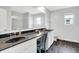 Bathroom featuring a large vanity with dual sinks and a separate shower at 2473 Shadow Bend Dr, Columbus, IN 47201