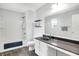 Bathroom featuring a vanity with a dark countertop and a bathtub with shower at 2473 Shadow Bend Dr, Columbus, IN 47201