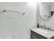 Bathroom with a marble vanity and a round mirror at 2473 Shadow Bend Dr, Columbus, IN 47201