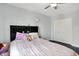 Charming bedroom featuring a ceiling fan and ample closet space at 2473 Shadow Bend Dr, Columbus, IN 47201