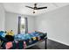 bedroom featuring a bed, curtains and various toys at 2473 Shadow Bend Dr, Columbus, IN 47201