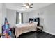 Well lit bedroom featuring a bed, curtains and various toys at 2473 Shadow Bend Dr, Columbus, IN 47201