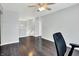 Bonus room featuring a ceiling fan and view into other parts of the house at 2473 Shadow Bend Dr, Columbus, IN 47201