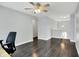 Bonus room featuring a ceiling fan and view into other parts of the house at 2473 Shadow Bend Dr, Columbus, IN 47201