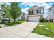 Two story home with stone veneer and siding, two car garage and ample driveway parking at 2473 Shadow Bend Dr, Columbus, IN 47201