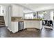 Stylish kitchen with white cabinetry, granite countertops, and stainless steel appliances at 2473 Shadow Bend Dr, Columbus, IN 47201