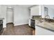 Functional kitchen space with tile flooring, stainless steel appliances, and granite countertops at 2473 Shadow Bend Dr, Columbus, IN 47201