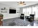 Spacious living room boasts natural light, hardwood floors, and an open layout perfect for entertaining at 2473 Shadow Bend Dr, Columbus, IN 47201