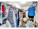 Organized walk-in closet with shelves and hanging rods for ample storage at 2473 Shadow Bend Dr, Columbus, IN 47201