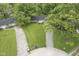 Aerial view of a charming home with a spacious front yard, surrounded by lush greenery at 2807 Westleigh Dr, Indianapolis, IN 46268