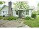 The backyard features a screen room, patio, and landscaped yard at 2807 Westleigh Dr, Indianapolis, IN 46268