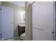 Well-lit bathroom with a shower, granite counter, and neutral colors at 2807 Westleigh Dr, Indianapolis, IN 46268