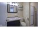 This bathroom has granite counters, storage and neutral wall color at 2807 Westleigh Dr, Indianapolis, IN 46268