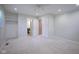 Spacious bedroom with ceiling fan and two closets, with a bathroom visible through an open doorway at 2807 Westleigh Dr, Indianapolis, IN 46268