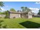 Large backyard featuring a well-kept lawn and comfortable outdoor space at 2810 Bittersweet Blvd, Columbus, IN 47203
