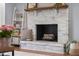 Stylish fireplace area with painted brick and decorative mantle in a cozy living space at 2810 Bittersweet Blvd, Columbus, IN 47203