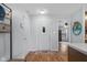 Inviting foyer with a bright white door and tile rug, leading to the main living areas at 2810 Bittersweet Blvd, Columbus, IN 47203