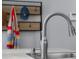 Modern kitchen sink with a stainless steel faucet and a view of stylish decor at 2810 Bittersweet Blvd, Columbus, IN 47203