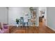 Stylish living room with desk, shelving, modern decor, and wood laminate flooring at 2810 Bittersweet Blvd, Columbus, IN 47203