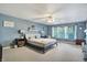 Bright bedroom with natural light, a ceiling fan, and tasteful decor at 3221 Holt St, Whiteland, IN 46184