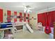 Fun bedroom with bunkbeds, slide, and swing chair provides the perfect space for to sleep and play at 3221 Holt St, Whiteland, IN 46184