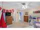 Spacious bedroom with bunkbeds, ceiling fan, and plenty of room for personalization and creative design at 3221 Holt St, Whiteland, IN 46184