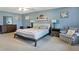 Comfortable bedroom with ample space and a relaxing sitting area at 3221 Holt St, Whiteland, IN 46184