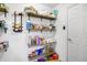 Well-organized walk-in pantry with shelving for food storage and easy access to items at 3221 Holt St, Whiteland, IN 46184