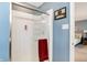 Modern shower with glass door, rainfall showerhead, and built-in shelving at 3221 Holt St, Whiteland, IN 46184