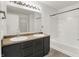 Bathroom featuring a double sink vanity and a shower with a tub at 3222 Enclave Ln, Greenwood, IN 46143