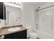 Well-lit bathroom featuring a sleek vanity, toilet, and shower-tub combination with modern fixtures at 3222 Enclave Ln, Greenwood, IN 46143