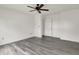 Modern bedroom with neutral walls, overhead fan, and gray flooring at 3222 Enclave Ln, Greenwood, IN 46143