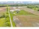 Wide aerial perspective featuring a home and surrounding fields in a serene landscape at 3319 E 700 N, Whiteland, IN 46184
