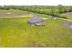 Aerial view of a home featuring a deck and hot tub in a spacious backyard at 3319 E 700 N, Whiteland, IN 46184