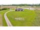 Scenic aerial view of home with sprawling green lawn and peaceful surroundings at 3319 E 700 N, Whiteland, IN 46184