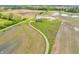 Expansive aerial view of a house surrounded by fields, showcasing its private setting at 3319 E 700 N, Whiteland, IN 46184