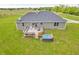 Backyard deck with hot tub, perfect for outdoor relaxation and entertainment at 3319 E 700 N, Whiteland, IN 46184