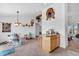 Eat-in kitchen leads to dining area with casual breakfast bar and views to dining room at 3319 E 700 N, Whiteland, IN 46184