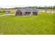 Charming brick home with a cozy front porch and well-manicured lawn at 3319 E 700 N, Whiteland, IN 46184