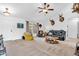 Inviting living room with plush carpet, ample seating, and natural light at 3319 E 700 N, Whiteland, IN 46184