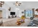 Spacious living room with neutral tones, large windows, and comfortable furnishings at 3319 E 700 N, Whiteland, IN 46184
