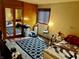 Bedroom featuring patterned floors, a closet with mirrored doors, and an open window at 3633 Tiffany Dr, Indianapolis, IN 46226